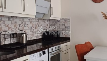 Квартира 1+1 с видом на бассейн в Махмутларе, 50 кв.м. - Ракурс 8