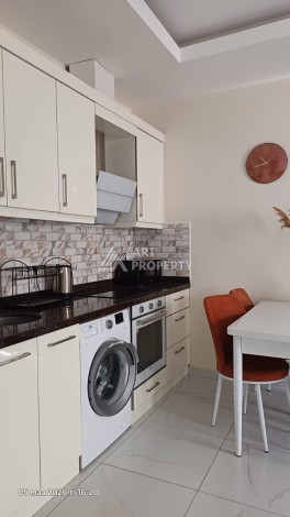 Квартира 1+1 с видом на бассейн в Махмутларе, 50 кв.м. - Ракурс 7