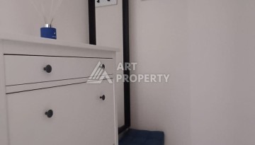 Квартира 1+1 с видом на бассейн в Махмутларе, 50 кв.м. - Ракурс 10