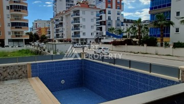 Квартира 1+1 с видом на бассейн в Махмутларе, 50 кв.м. - Ракурс 11