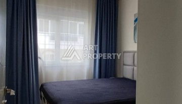 Квартира 1+1 с видом на бассейн в Махмутларе, 50 кв.м. - Ракурс 13