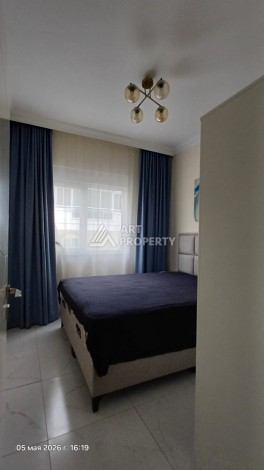 Квартира 1+1 с видом на бассейн в Махмутларе, 50 кв.м. - Ракурс 12