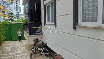 Квартира 1+1 с видом на бассейн в Махмутларе, 50 кв.м. - Ракурс 18