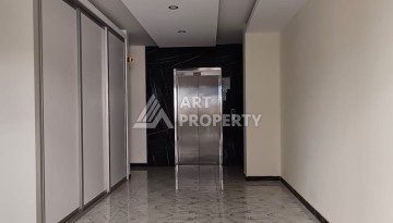 Квартира 1+1 с видом на бассейн в Махмутларе, 50 кв.м. - Ракурс 19