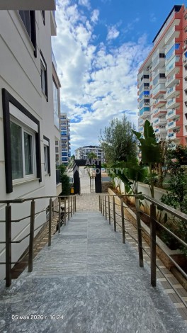 Квартира 1+1 с видом на бассейн в Махмутларе, 50 кв.м. - Ракурс 20