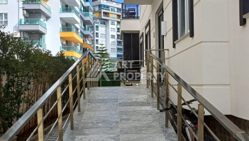 Квартира 1+1 с видом на бассейн в Махмутларе, 50 кв.м. - Ракурс 23