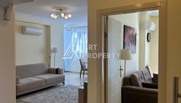 Квартира 1+1 с видом на море и горы в Махмутларе, 67 кв.м. - Ракурс 2