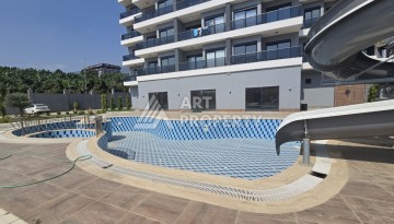 Недорогая квартира 1+1 в новой резиденции, 54 кв.м. в Махмутларе - Ракурс 2