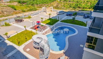 Недорогая квартира 1+1 в новой резиденции, 54 кв.м. в Махмутларе - Ракурс 3