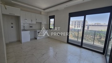 Недорогая квартира 1+1 в новой резиденции, 54 кв.м. в Махмутларе - Ракурс 5