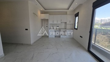 Недорогая квартира 1+1 в новой резиденции, 54 кв.м. в Махмутларе - Ракурс 8