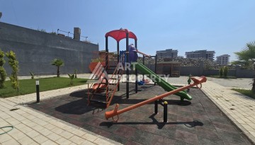 Недорогая квартира 1+1 в новой резиденции, 54 кв.м. в Махмутларе - Ракурс 18