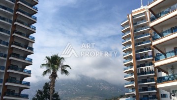 Квартира 1+1 в престижной резиденции Махмутлара, 65 кв.м. - Ракурс 20
