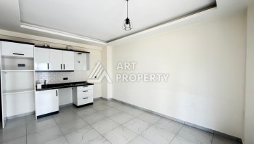 Квартира 1+1 с большим балконом Махмутларе, 55 кв.м. - Ракурс 3