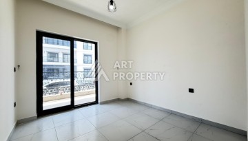 Квартира 1+1 с большим балконом Махмутларе, 55 кв.м. - Ракурс 4
