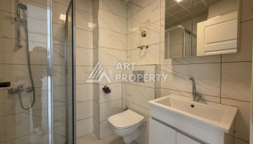 Квартира 1+1 с большим балконом Махмутларе, 55 кв.м. - Ракурс 5