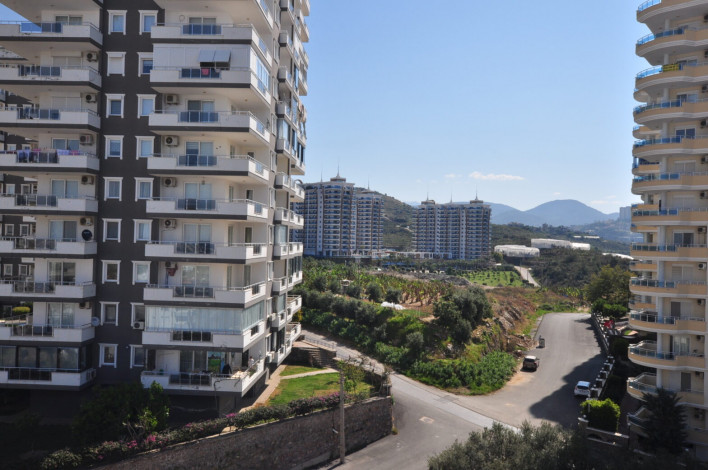 Четырехкомнатная квартира-дуплекс на высоком этаже с частичным видом на море в районе Махмутлар, 220 м2 - Ракурс 14