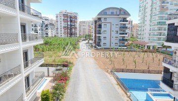 Квартира 1+1 с большим балконом Махмутларе, 55 кв.м. - Ракурс 7