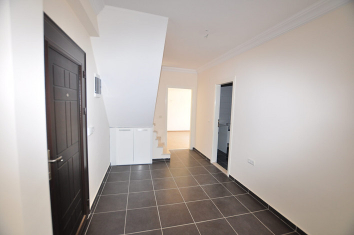 Четырехкомнатная квартира-дуплекс на высоком этаже с частичным видом на море в районе Махмутлар, 220 м2 - Ракурс 15