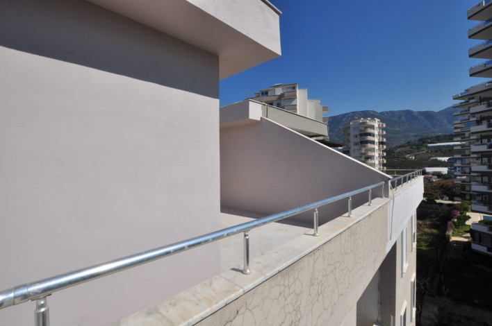 Четырехкомнатная квартира-дуплекс на высоком этаже с частичным видом на море в районе Махмутлар, 220 м2 - Ракурс 22