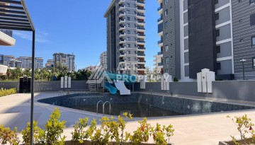 Стильная квартира 1+1 рядом в центре Махмутлара, 50 кв.м - Ракурс 2