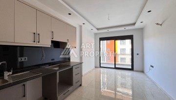 Стильная квартира 1+1 рядом в центре Махмутлара, 50 кв.м - Ракурс 5