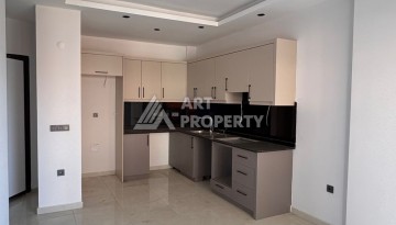 Стильная квартира 1+1 рядом в центре Махмутлара, 50 кв.м - Ракурс 8