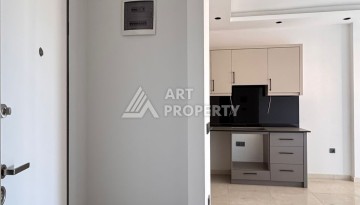 Стильная квартира 1+1 рядом в центре Махмутлара, 50 кв.м - Ракурс 9