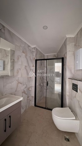 Стильная квартира 1+1 рядом в центре Махмутлара, 50 кв.м - Ракурс 9