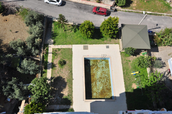 Четырехкомнатная квартира-дуплекс на высоком этаже с частичным видом на море в районе Махмутлар, 220 м2 - Ракурс 27