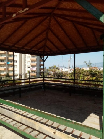 Четырехкомнатная квартира-дуплекс на высоком этаже с частичным видом на море в районе Махмутлар, 220 м2 - Ракурс 29