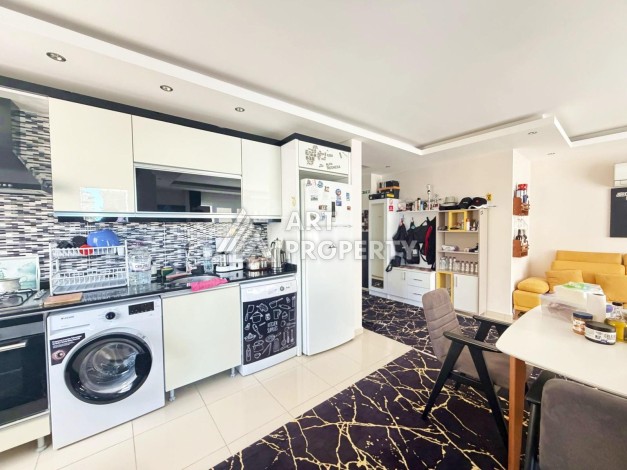 Просторная квартира 1+1 в центре Махмутлара — 83 м² - Ракурс 9