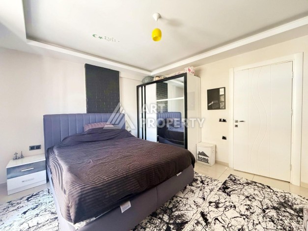Просторная квартира 1+1 в центре Махмутлара — 83 м² - Ракурс 14