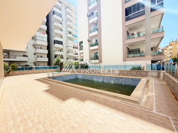 Просторная квартира 1+1 в центре Махмутлара — 83 м² - Ракурс 27