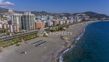 Квартира 1+1 с видом на море в Махмутларе, 60 кв.м. - Ракурс 2