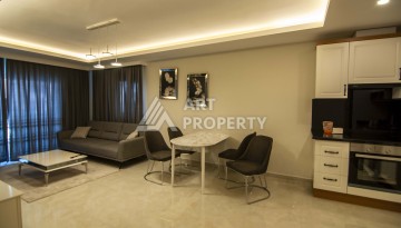 Квартира 1+1 с видом на море в Махмутларе, 60 кв.м. - Ракурс 4