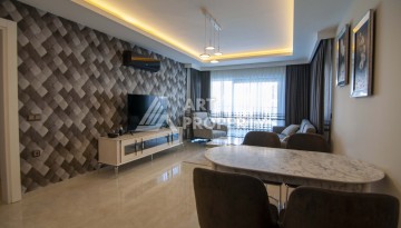 Квартира 1+1 с видом на море в Махмутларе, 60 кв.м. - Ракурс 6