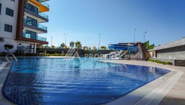 Квартира 1+1 с видом на море в Махмутларе, 60 кв.м. - Ракурс 18