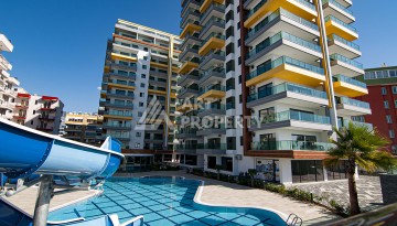 Квартира 1+1 с видом на море в Махмутларе, 60 кв.м. - Ракурс 27