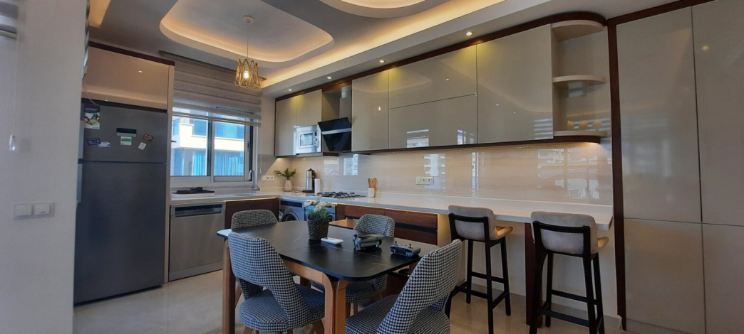 Трехкомнатная квартира в одном из лучших комплексов района Махмтулар,  130 м2 - Ракурс 9