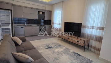 Большая квартира 1+1 в престижной резиденции Махмутлара, 65 кв.м - Ракурс 12