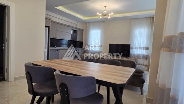 Большая квартира 1+1 в престижной резиденции Махмутлара, 65 кв.м - Ракурс 19