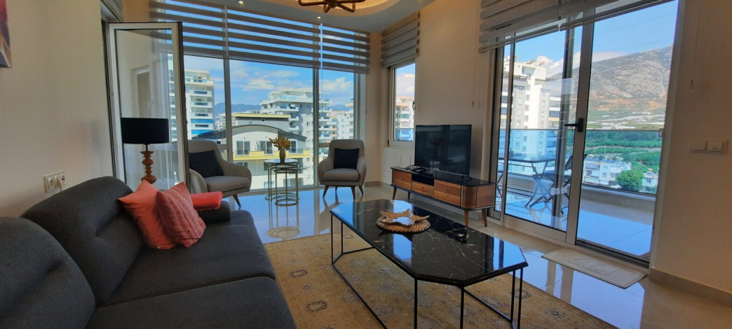 Трехкомнатная квартира в одном из лучших комплексов района Махмтулар,  130 м2 - Ракурс 17