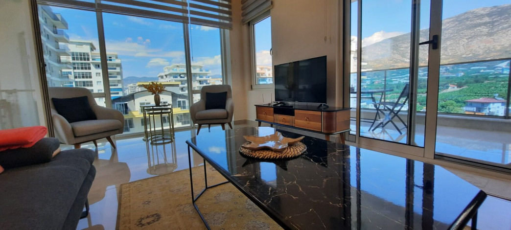 Трехкомнатная квартира в одном из лучших комплексов района Махмтулар,  130 м2 - Ракурс 18