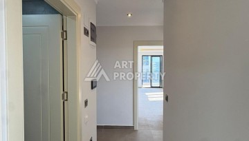 Квартира 2+1 в Махмутларе, 90 кв.м. Современный ЖК - Ракурс 8