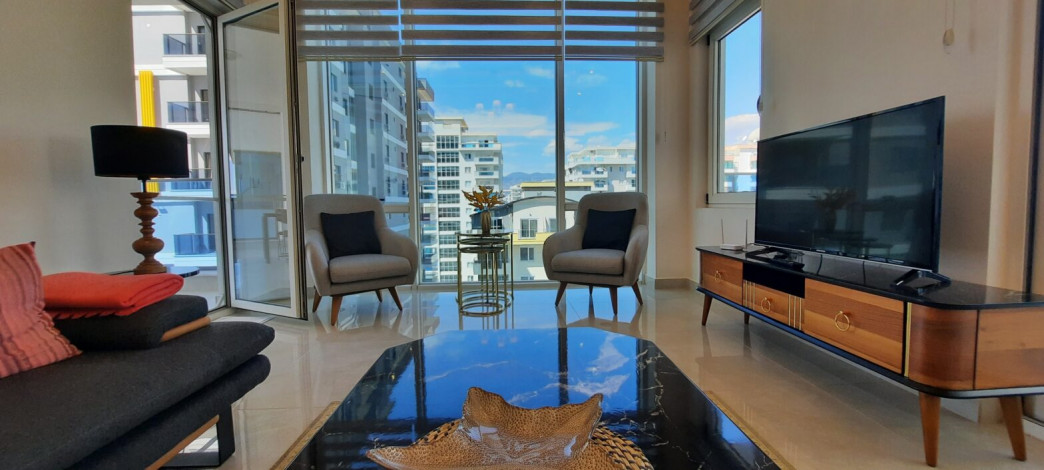 Трехкомнатная квартира в одном из лучших комплексов района Махмтулар,  130 м2 - Ракурс 19