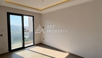 Квартира 2+1 в Махмутларе, 90 кв.м. Современный ЖК - Ракурс 18
