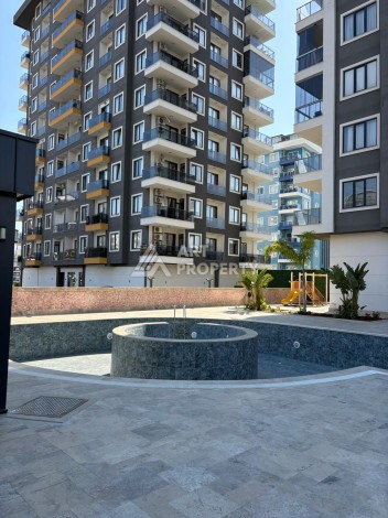 Квартира 2+1 в Махмутларе, 90 кв.м. Современный ЖК - Ракурс 20