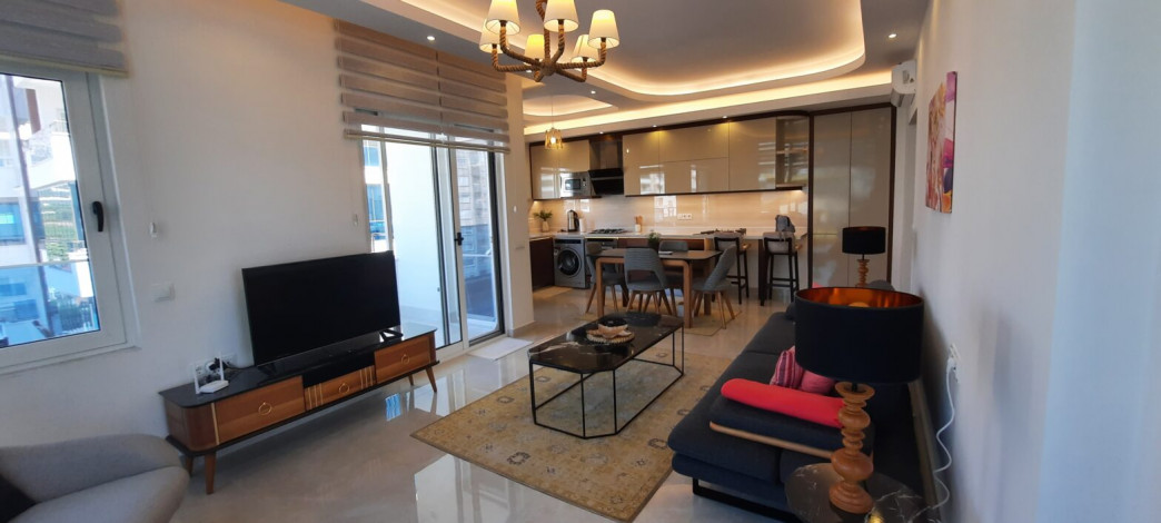 Трехкомнатная квартира в одном из лучших комплексов района Махмтулар,  130 м2 - Ракурс 20