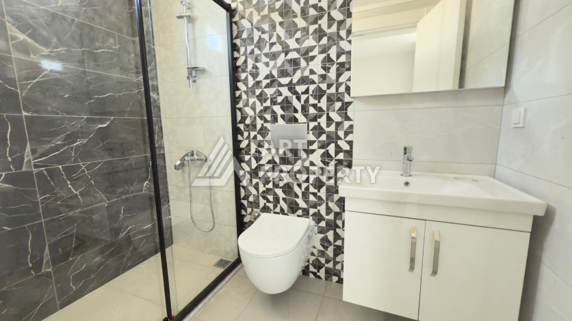 Просторный дуплекс 3+1 в центре Махмутлара, 192 м² - Ракурс 28